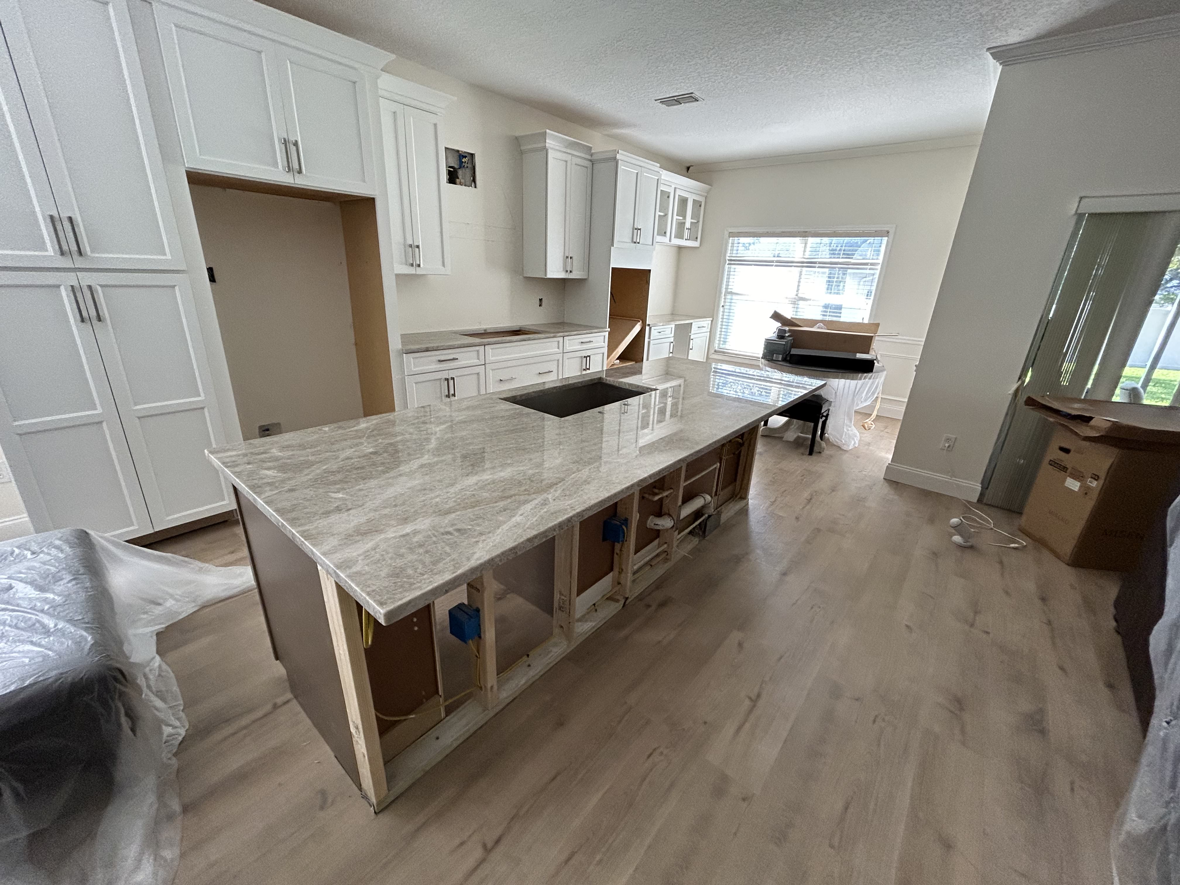 Kitchen under renovation with quartz